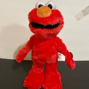 Sesame Street Plush slide singing and dancing Elmo - Bright Red with Orange Nose
